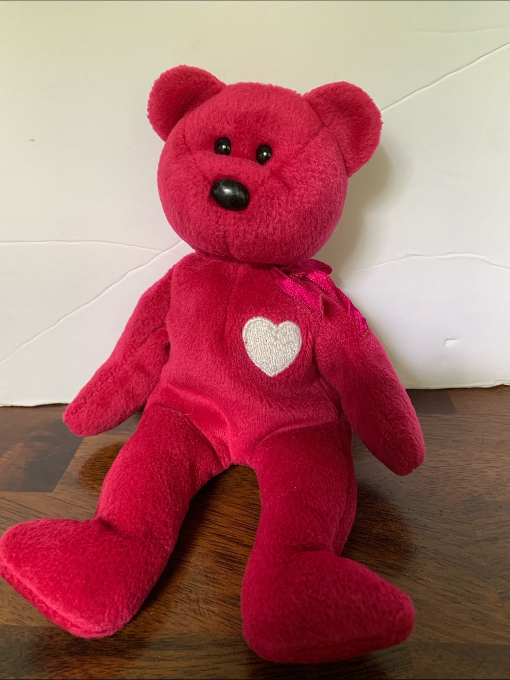 Ty Beanie Baby "Valentina" bear in pink plush with a white embroidered heart